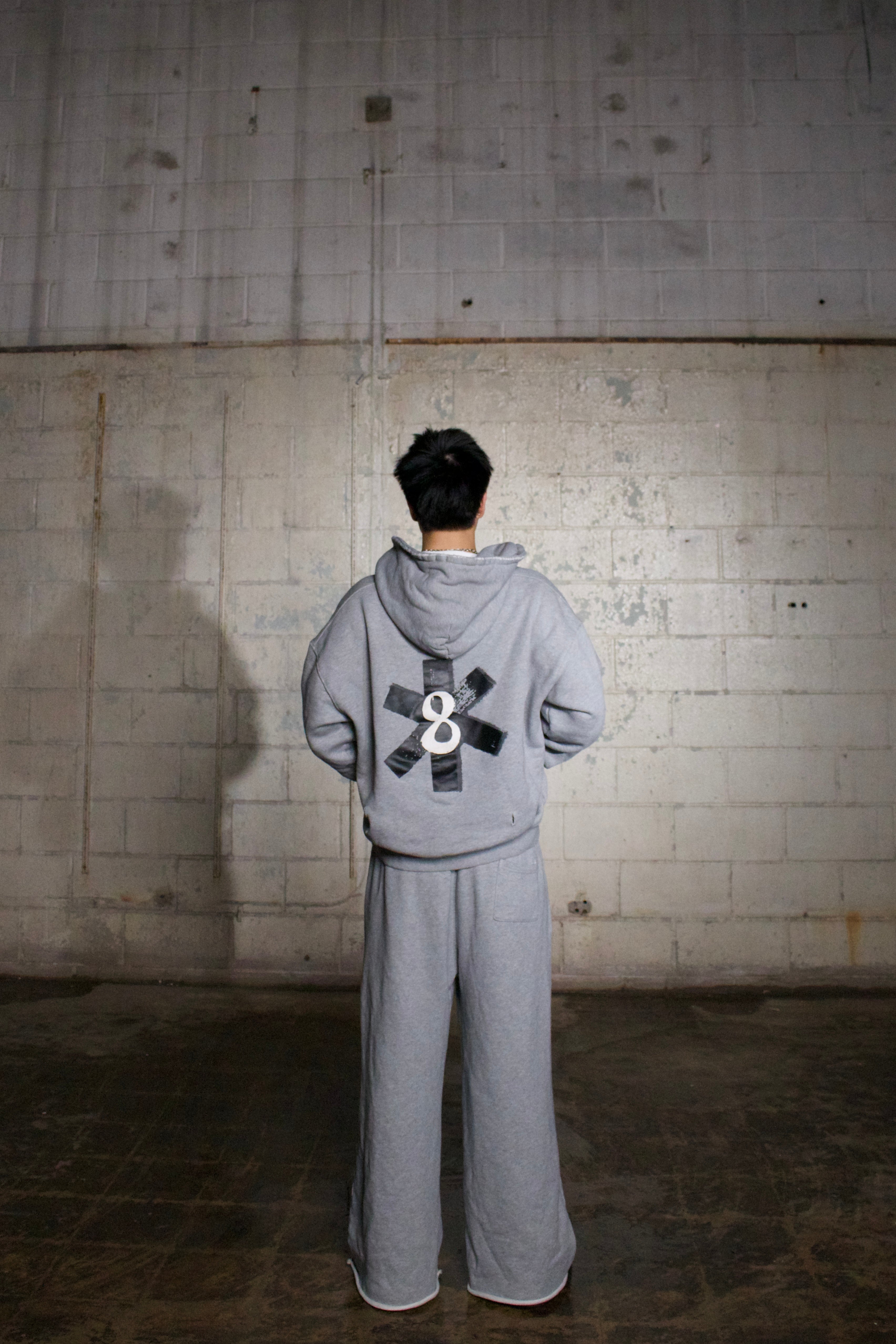 Distressed logo zip-up