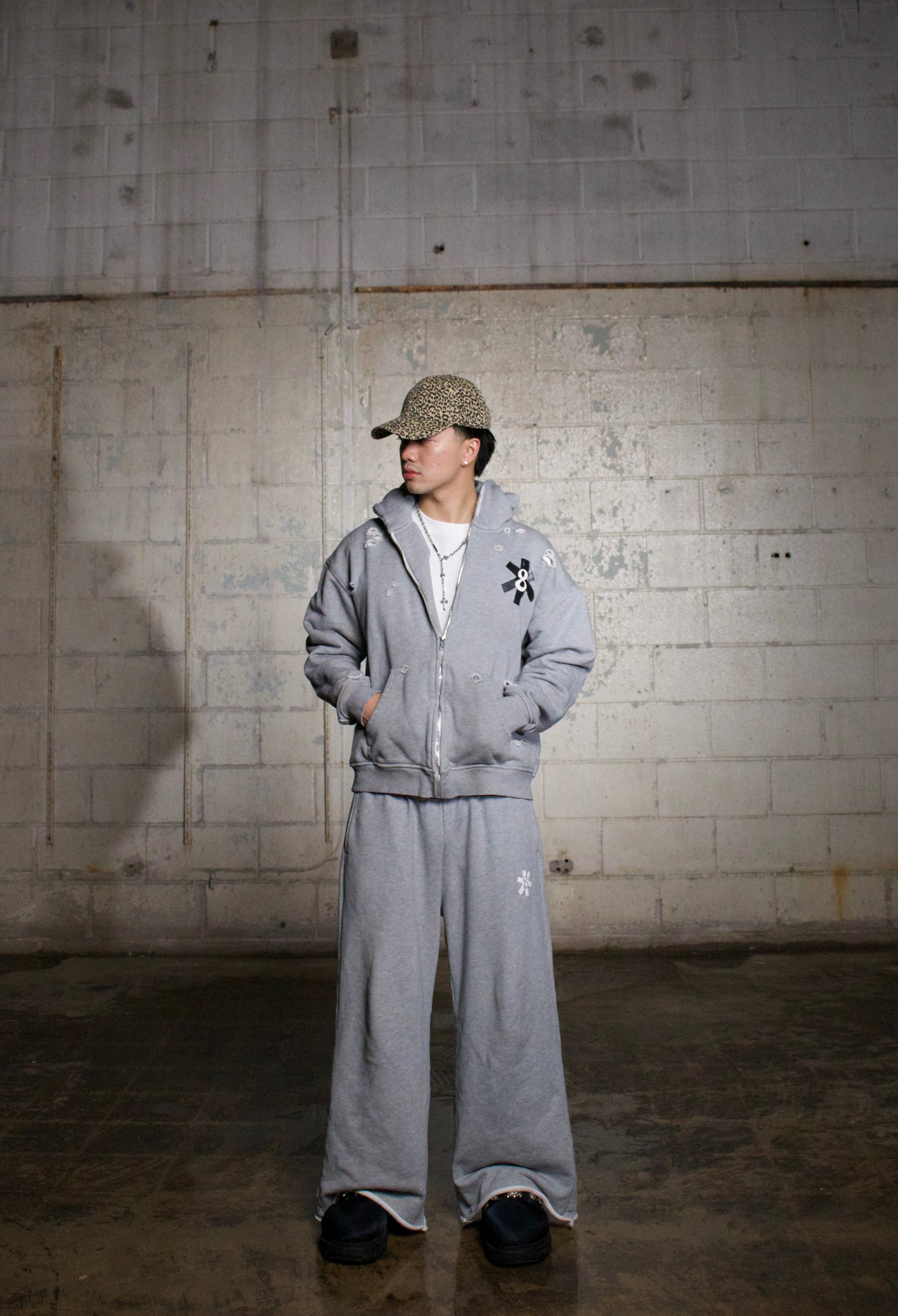 Distressed logo zip-up