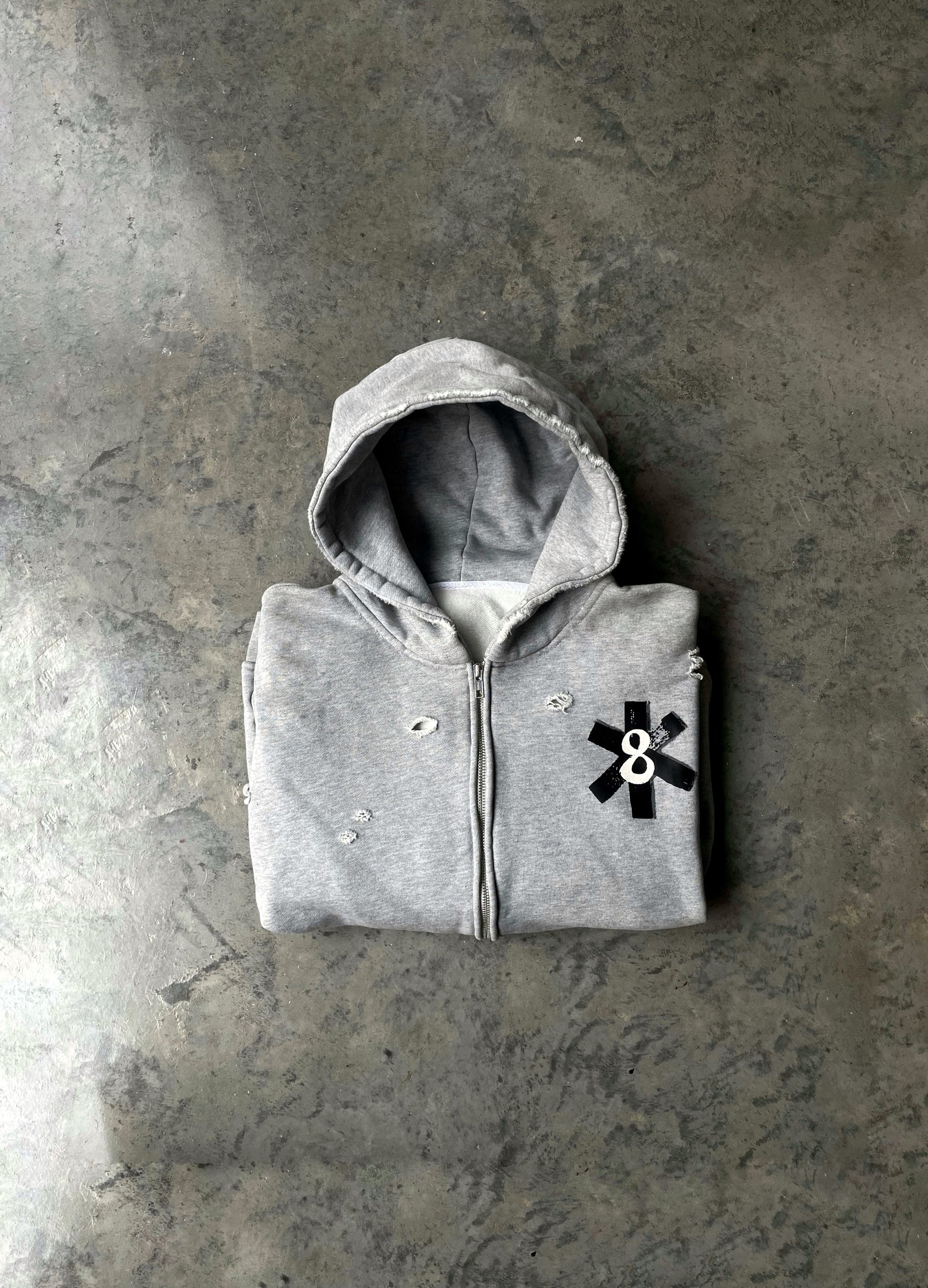 Distressed logo zip-up